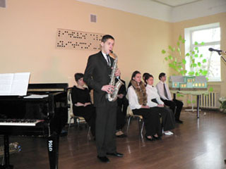 Concert - saxophone player