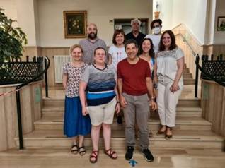May be an image of 7 people, people standing and indoor