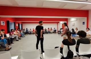 May be an image of 17 people, people standing and indoor